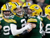 Packers K Mason Crosby celebrates a game-winning field goal over the 49ers
