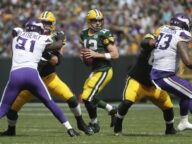 Packers' QB Aaron Rodgers looks to pass against the Minnesota Vikings