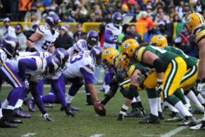 The Green Bay Packers line up against the Minnesota Vikings.