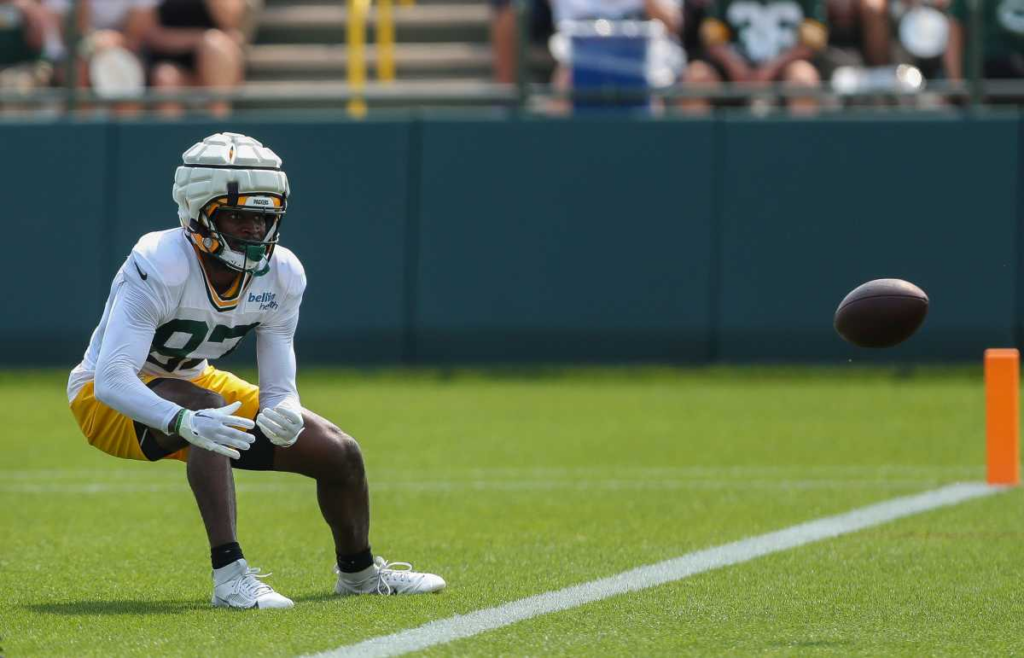 WR Romeo Doubs catching passes at training camp 