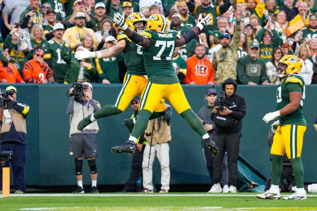 packers Tucker Kraft and Jordan Morgan celebrating